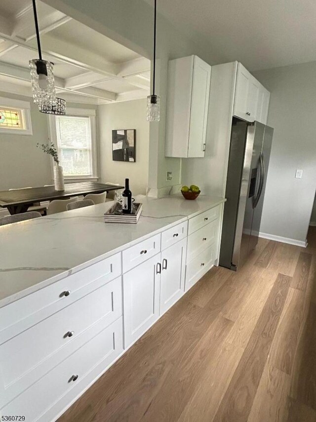 96 Franklin Ave, Maplewood Twp, NJ 07040 - kitchen featuring coffered ceiling, stainless steel fridge with ice dispenser, wood finished floors, white cabinets, and hanging light fixtures