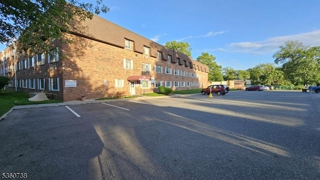 255 Tucker Ave Unit 239, Union Twp, NJ 07083 - view of building exterior featuring uncovered parking