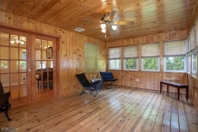 455 Rte 206, Andover Twp, NJ 07860 - living area featuring ceiling fan, wood-type flooring, wooden walls, and wood ceiling