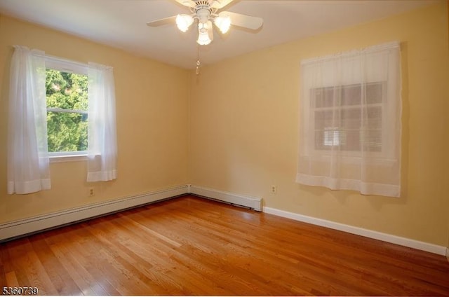 455 Rte 206, Andover Twp, NJ 07860 - empty room with wood finished floors, a ceiling fan, and baseboards