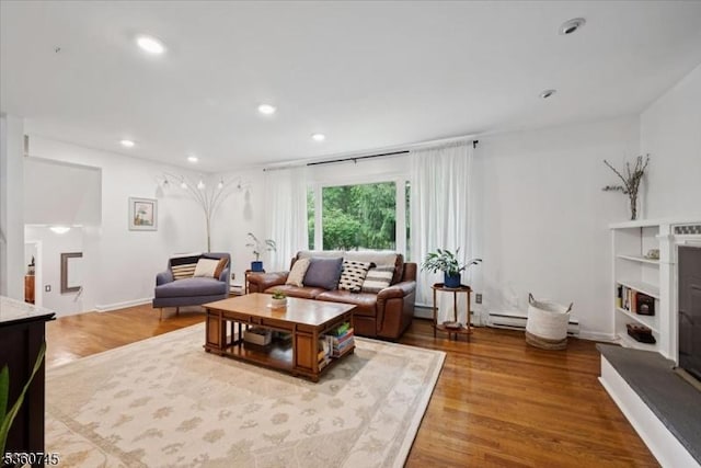 42 Wildwood Ter, Watchung Boro, NJ 07069 - living area with wood finished floors, recessed lighting, and baseboard heating