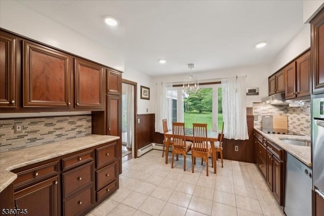 42 Wildwood Ter, Watchung Boro, NJ 07069 - kitchen with light tile patterned floors, dishwasher, tasteful backsplash, hanging light fixtures, and light stone counters