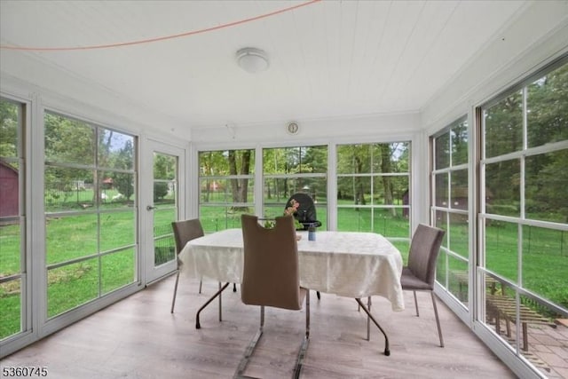 42 Wildwood Ter, Watchung Boro, NJ 07069 - sunroom with plenty of natural light, wood finished floors, and outdoor dining space