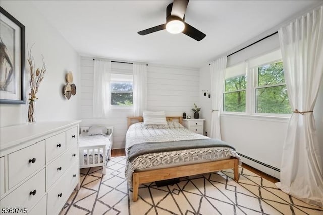 42 Wildwood Ter, Watchung Boro, NJ 07069 - bedroom featuring a baseboard heating unit and a ceiling fan