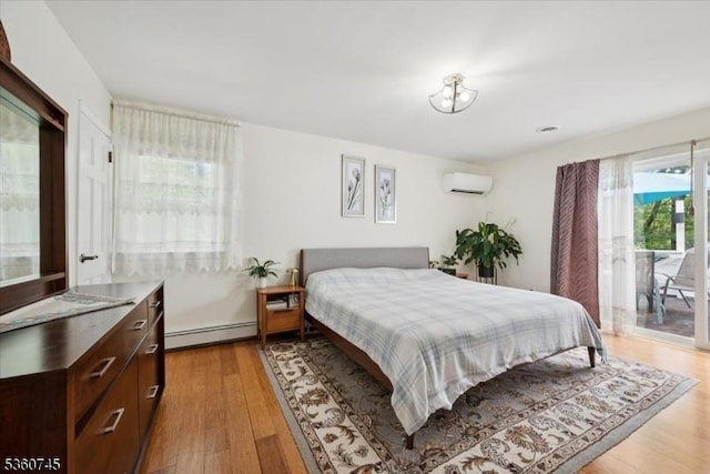 42 Wildwood Ter, Watchung Boro, NJ 07069 - bedroom featuring baseboard heating, access to exterior, light wood-style floors, and a wall mounted air conditioner