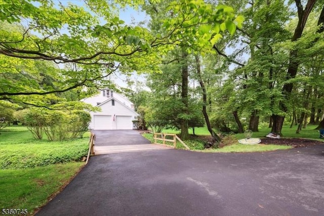 42 Wildwood Ter, Watchung Boro, NJ 07069 - obstructed view of property featuring a garage and driveway