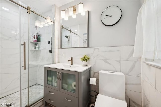 42 Wildwood Ter, Watchung Boro, NJ 07069 - bathroom with tile walls, a stall shower, and vanity