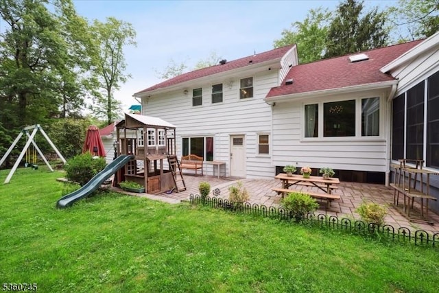 42 Wildwood Ter, Watchung Boro, NJ 07069 - back of property with a playground, a yard, and a patio