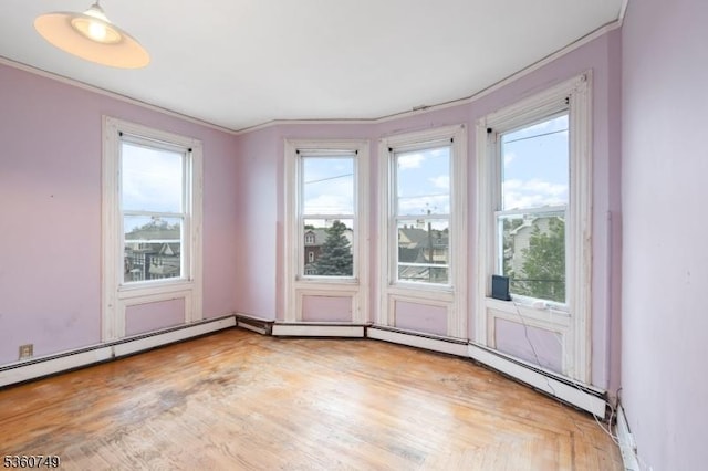 30-32 Geneva St, Elizabeth City, NJ 07206 - unfurnished room featuring plenty of natural light and crown molding