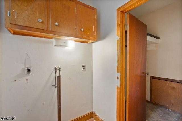 30-32 Geneva St, Elizabeth City, NJ 07206 - laundry area featuring cabinet space and washer hookup