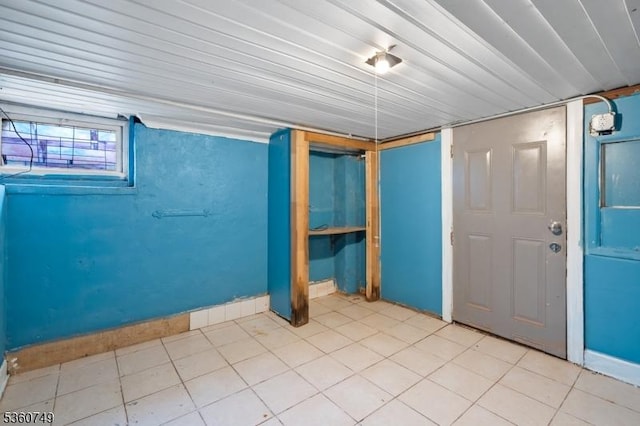 30-32 Geneva St, Elizabeth City, NJ 07206 - below grade area featuring tile patterned floors and baseboards