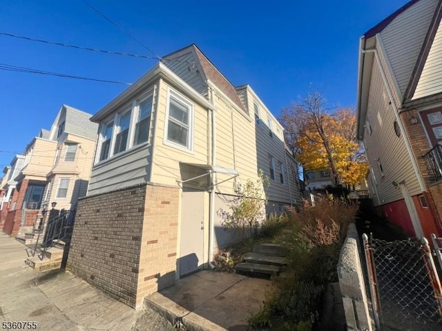 118 Maple St, Kearny Town, NJ 07032 - view of home's exterior featuring brick siding