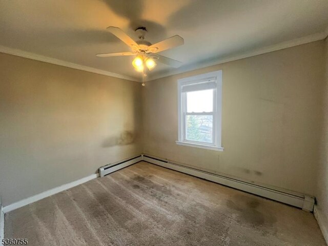 118 Maple St, Kearny Town, NJ 07032 - empty room with ornamental molding, ceiling fan, carpet floors, baseboards, and baseboard heating