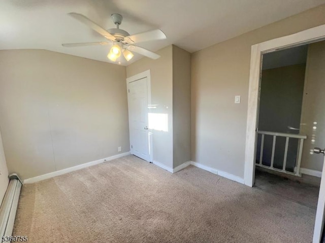 118 Maple St, Kearny Town, NJ 07032 - unfurnished bedroom featuring a baseboard heating unit, carpet floors, baseboards, a ceiling fan, and lofted ceiling