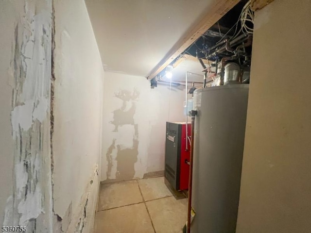 118 Maple St, Kearny Town, NJ 07032 - unfinished below grade area with water heater and a heating unit