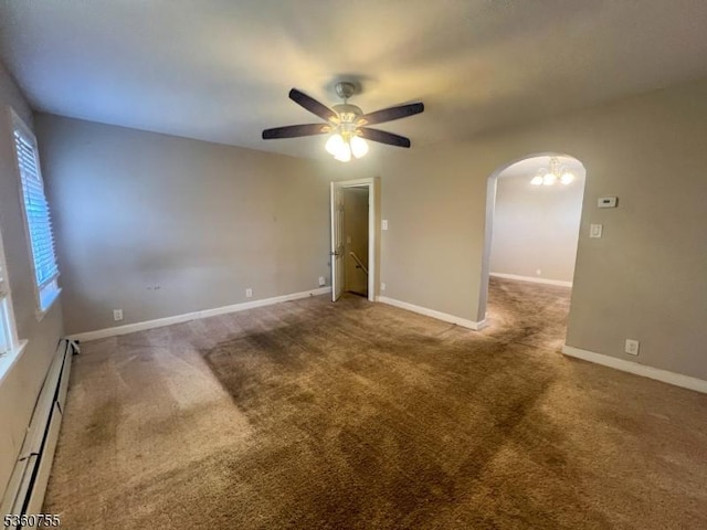 118 Maple St, Kearny Town, NJ 07032 - carpeted empty room featuring a baseboard radiator, arched walkways, ceiling fan, and baseboards