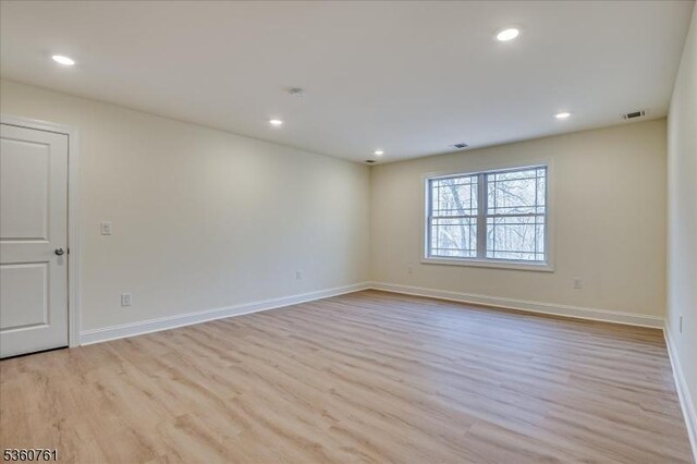92 Hancock Rd, Piscataway Twp, NJ 08854 - spare room with light wood-style flooring, baseboards, and recessed lighting