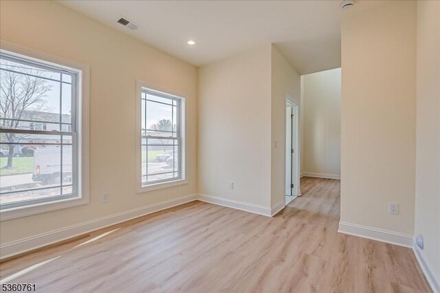 92 Hancock Rd, Piscataway Twp, NJ 08854 - unfurnished room with healthy amount of natural light, light wood-style flooring, baseboards, and recessed lighting