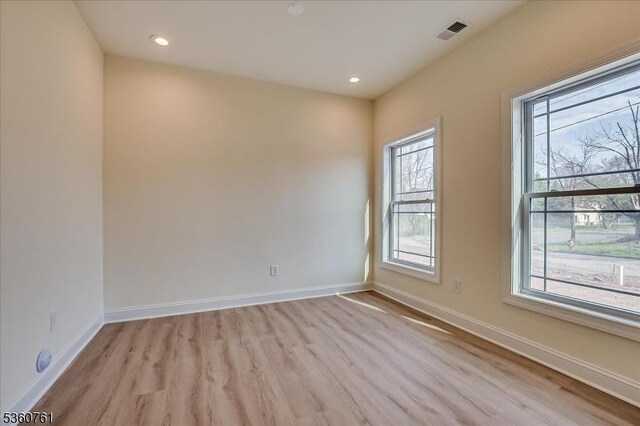 92 Hancock Rd, Piscataway Twp, NJ 08854 - empty room featuring light wood-type flooring, baseboards, and recessed lighting