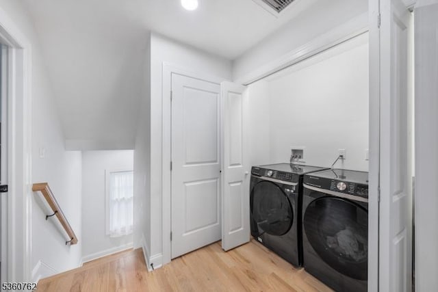 29 Tennis Rd, Jefferson Twp, NJ 07849 - washroom featuring independent washer and dryer, light wood-style floors, and baseboards