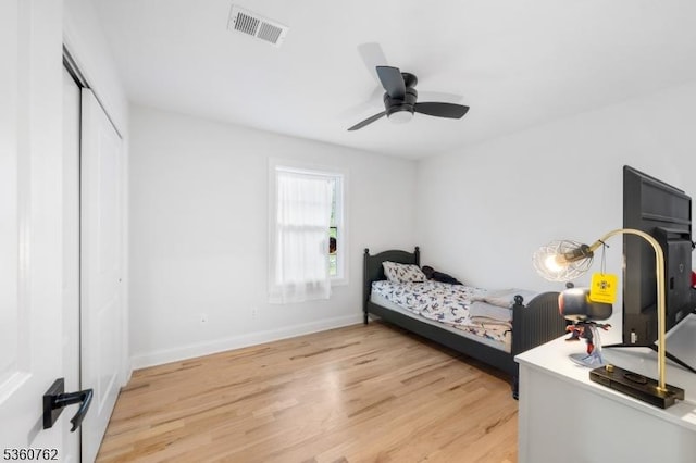 29 Tennis Rd, Jefferson Twp, NJ 07849 - bedroom with light wood-style floors, baseboards, a closet, and a ceiling fan