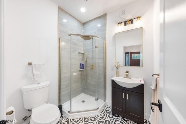 29 Tennis Rd, Jefferson Twp, NJ 07849 - bathroom with toilet, vanity, a stall shower, tile patterned flooring, and recessed lighting