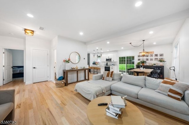 29 Tennis Rd, Jefferson Twp, NJ 07849 - living area with recessed lighting and light wood finished floors