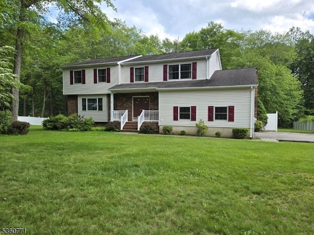 14 Constitution Ave, Roxbury Twp, NJ 07876 - view of front facade featuring a front yard and view of scattered trees