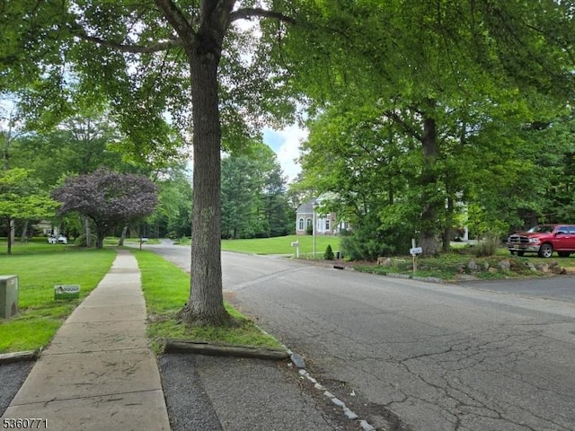 14 Constitution Ave, Roxbury Twp, NJ 07876 - view of asphalt street with view of scattered trees