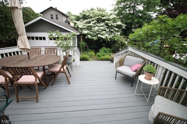 137 Oak Ridge Ave, Nutley Twp, NJ 07110 - wooden terrace featuring outdoor dining area and an outdoor structure