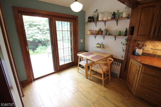137 Oak Ridge Ave, Nutley Twp, NJ 07110 - dining room featuring radiator heating unit and light wood-type flooring