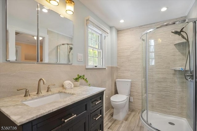 30 Newman Ave, Verona Twp, NJ 07044 - full bathroom with tile walls, vanity, a shower stall, toilet, and recessed lighting