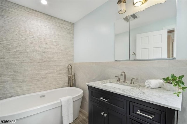 30 Newman Ave, Verona Twp, NJ 07044 - full bath with tile walls, a freestanding tub, and vanity