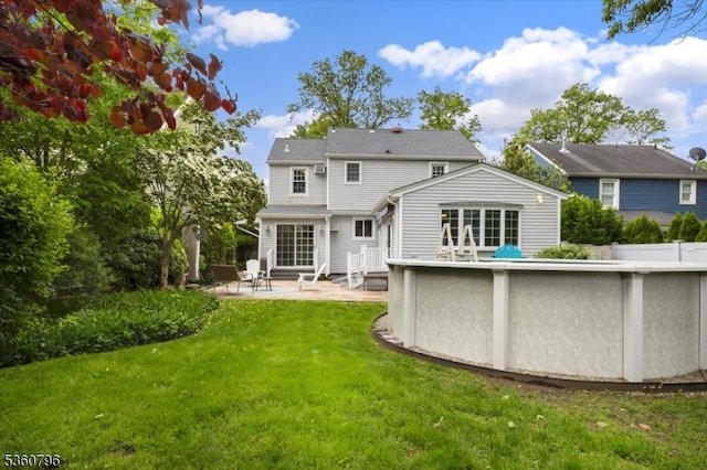 30 Newman Ave, Verona Twp, NJ 07044 - rear view of house with a patio area, a yard, and an outdoor pool