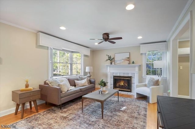 30 Newman Ave, Verona Twp, NJ 07044 - living area with ceiling fan, ornamental molding, wood finished floors, a fireplace, and recessed lighting