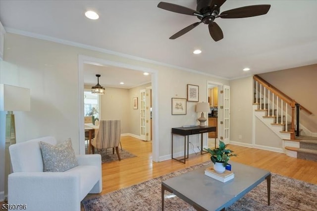 30 Newman Ave, Verona Twp, NJ 07044 - living area with stairway, wood finished floors, crown molding, ceiling fan, and baseboards