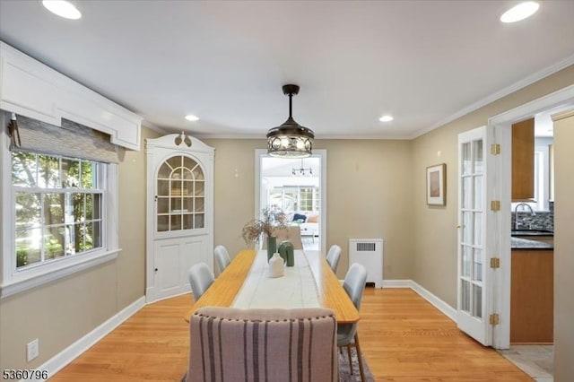 30 Newman Ave, Verona Twp, NJ 07044 - dining space with radiator, crown molding, light wood-style floors, baseboards, and recessed lighting