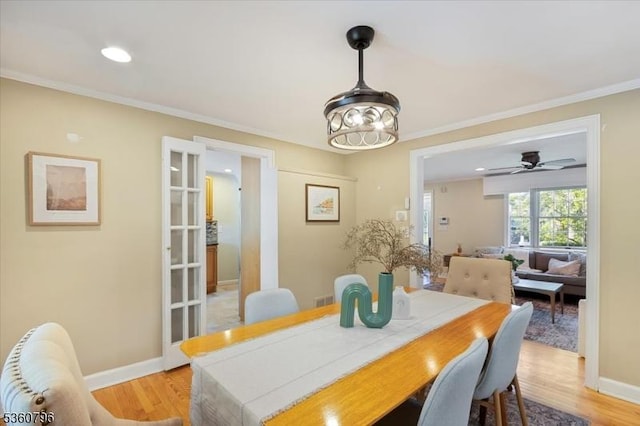 30 Newman Ave, Verona Twp, NJ 07044 - dining room with ornamental molding, light wood finished floors, and baseboards