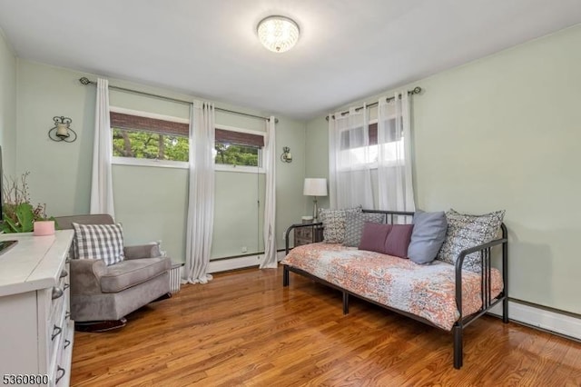 31 Woodside Ave, Cranford Twp, NJ 07016 - living area featuring light wood-style floors and baseboard heating