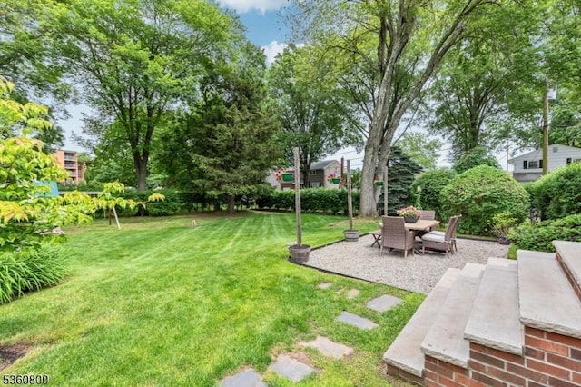 31 Woodside Ave, Cranford Twp, NJ 07016 - view of green lawn with a patio