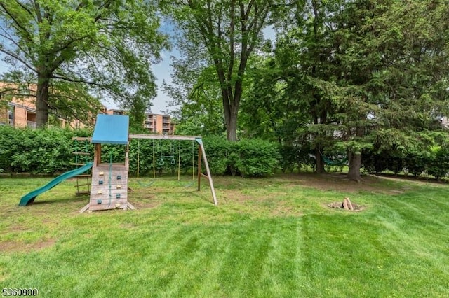31 Woodside Ave, Cranford Twp, NJ 07016 - view of green lawn with a playground