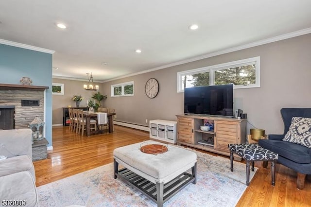 31 Woodside Ave, Cranford Twp, NJ 07016 - living area featuring crown molding, a chandelier, light wood-style flooring, recessed lighting, and baseboard heating