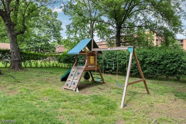 31 Woodside Ave, Cranford Twp, NJ 07016 - view of playground with a lawn