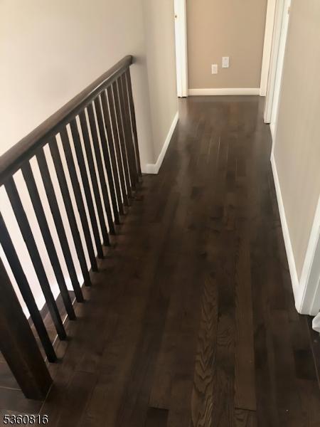 103 Mountain Top Rd, Lebanon Twp, NJ 08826 - hallway with baseboards and dark wood-style floors