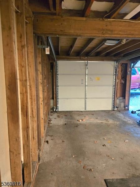 103 Mountain Top Rd, Lebanon Twp, NJ 08826 - garage featuring a garage door opener