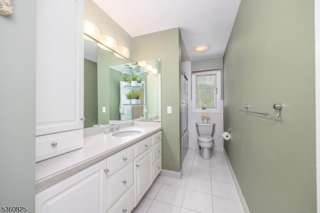 542 Drakestown Rd, Mount Olive Twp, NJ 07836 - bathroom featuring tile patterned floors, vanity, toilet, baseboards, and enclosed tub / shower combo