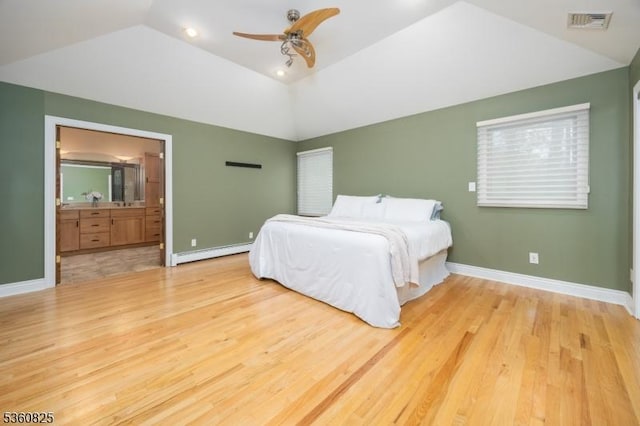 542 Drakestown Rd, Mount Olive Twp, NJ 07836 - bedroom with a baseboard heating unit, lofted ceiling, wood finished floors, baseboards, and ensuite bath