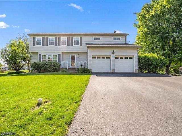 5 Portsmouth Ct, Raritan Twp, NJ 08822 - view of front facade featuring driveway, a front lawn, and a garage