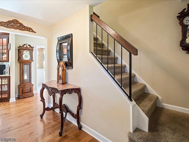 5 Portsmouth Ct, Raritan Twp, NJ 08822 - staircase featuring baseboards and wood finished floors