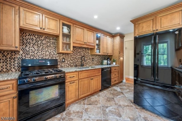 39 Fox Chase Run, Hillsborough Twp, NJ 08844 - kitchen featuring black appliances, a sink, tasteful backsplash, light stone counters, and recessed lighting